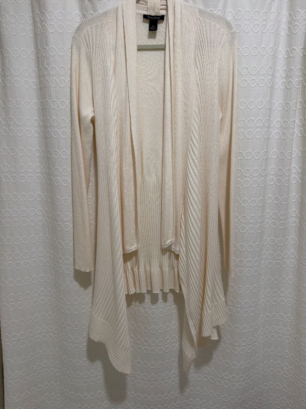NWOT.. Beautiful long sweater in ivory.  Size large